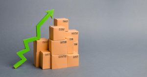 Pudełka i zielony znak wzrostu sprzedaży. Diamenty Forbesa” 2024 dla etisoft packaging system sp. z o.o.